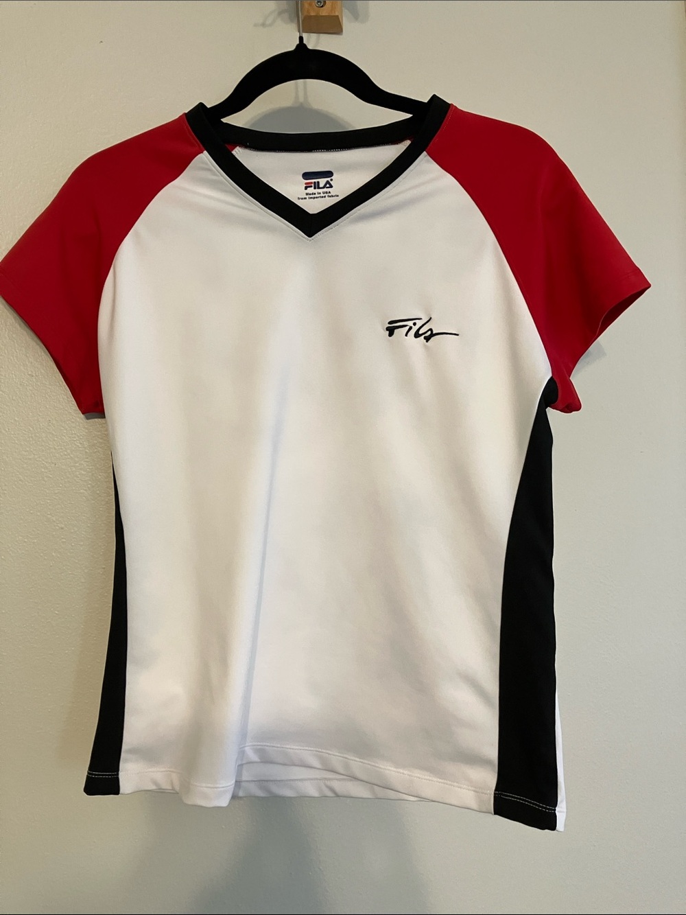 FILA v neck athletic shirt short sleeve XL? Fits like medium
